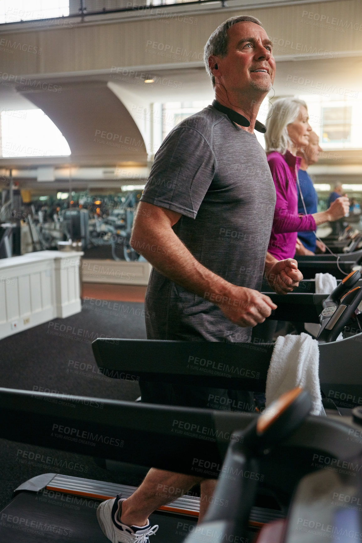 Buy stock photo Thinking, gym or mature man on treadmill in workout or training for class, health or cardio wellness. Runner, retirement and happy senior person on running machine for fitness, energy or exercise