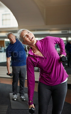 Buy stock photo Senior fitness, dumbbells and people stretching at gym for training, wellness and cardio exercise. Class, workout and elderly men with old personal trainer for weightlifting, support or bodybuilding
