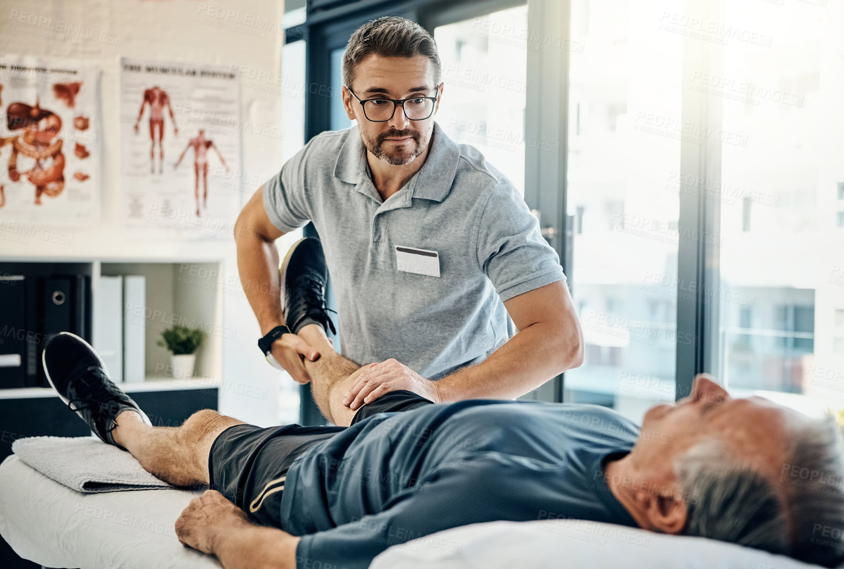 Buy stock photo Physiotherapy, senior man and stretching for knee health, medical and consultant with injury support. Consultation, chiropractor and physical therapy with rehabilitation and care in doctor office