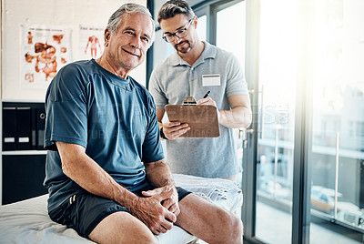 Buy stock photo Portrait of a mature man smiling during a consultation with his physiotherapist in the rehabilitation center
