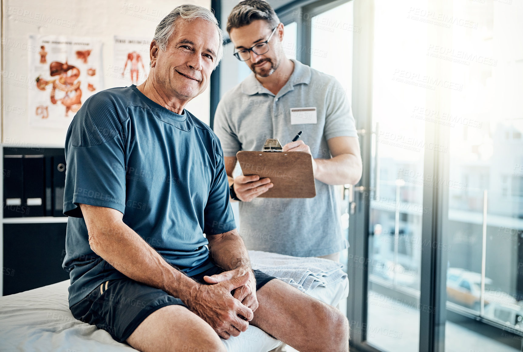 Buy stock photo Physiotherapy, chiropractor with clipboard and old man for rehabilitation, recovery and treatment. Healthcare, physical therapy and person with patient for medical service, wellness and consulting