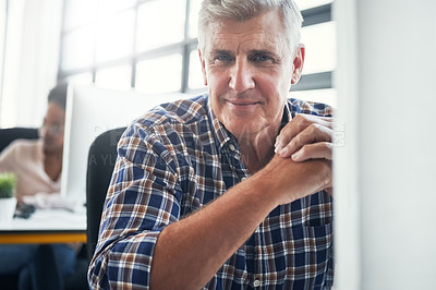 Buy stock photo Portrait of a male designer sitting at his desk