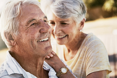 Buy stock photo Shot of a happy senior couple spending quality time together outside