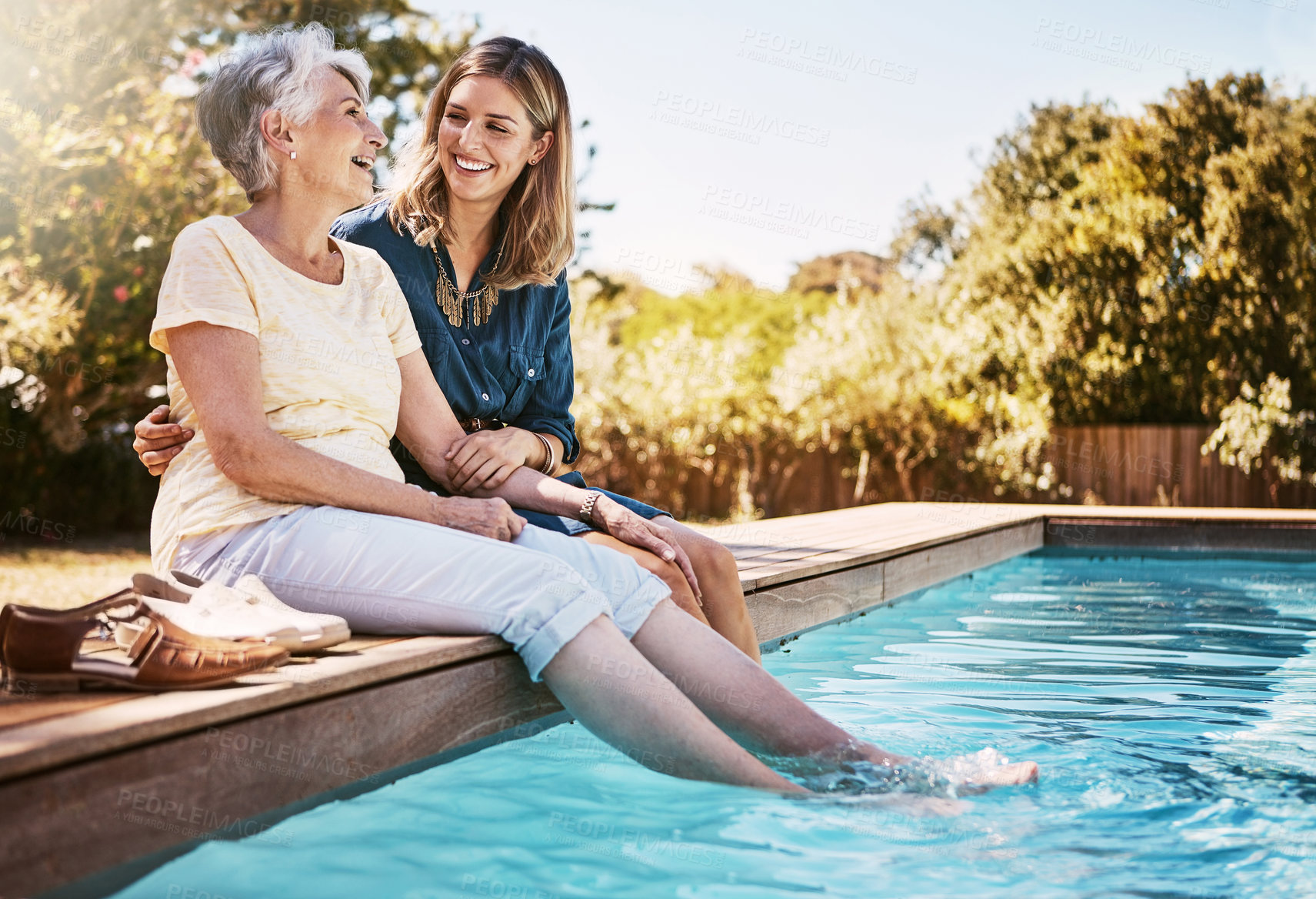 Buy stock photo Family, women by pool and relax together with love and care, quality time in summer vacation. Elderly mother, daughter and vacation, outdoor swimming pool and wellness lifestyle with happy family