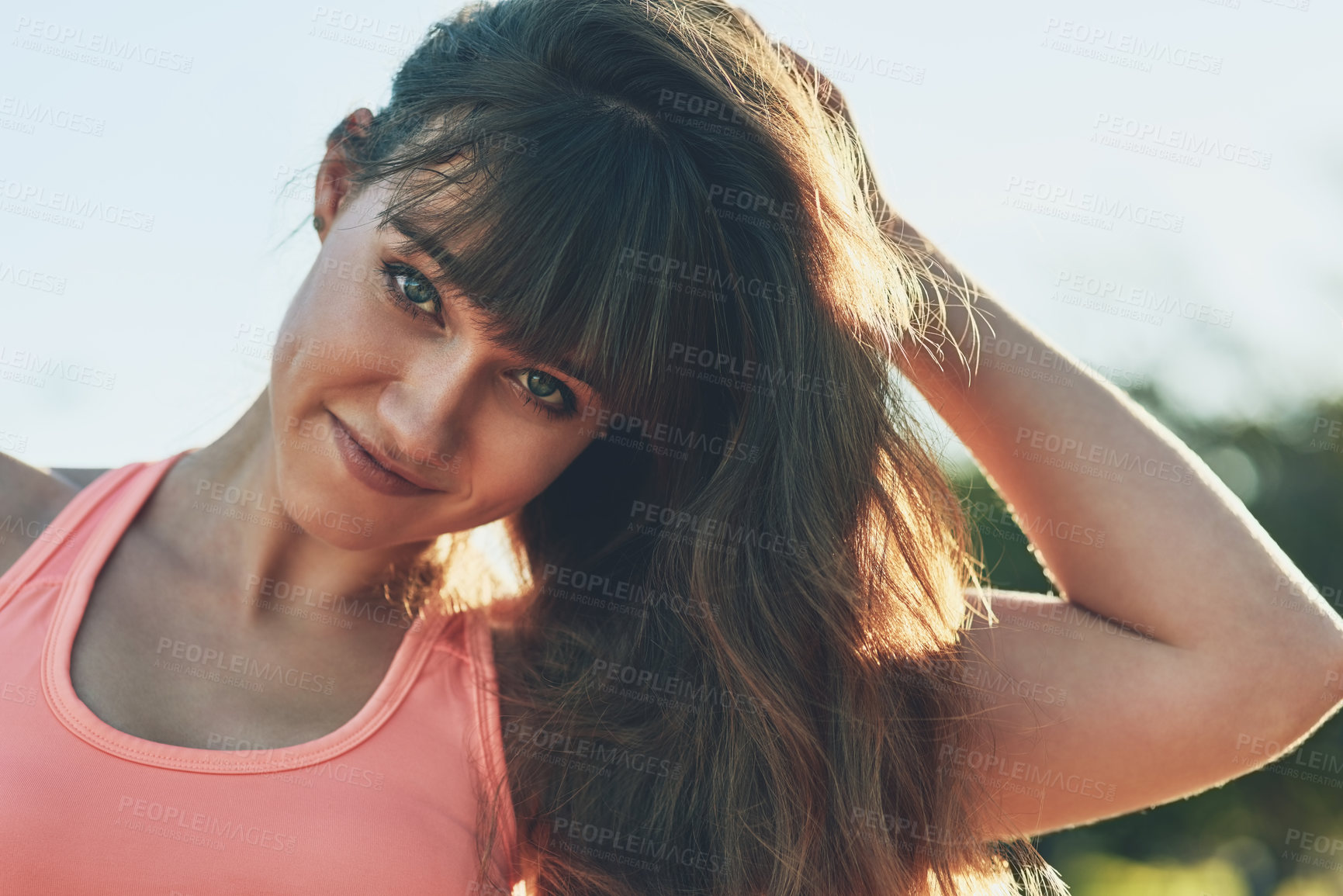Buy stock photo Cropped shot of a beautiful young woman out for her morning workout
