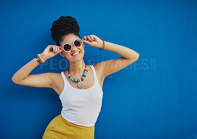 Buy stock photo Fashion, sunglasses and portrait of woman on blue background, wall and summer streetwear, trendy clothes or shades mockup. Girl, happy and excited model with cool style, vision and urban mock up