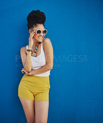 Buy stock photo Sunglasses, fashion and portrait of woman on blue background, wall and summer streetwear, trendy clothes or shades mockup. Girl, happy and excited model with cool style, vision and urban mock up