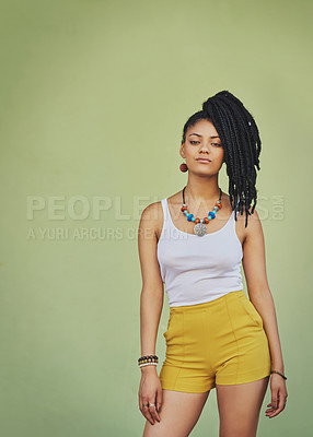 Buy stock photo Portrait of black woman, urban fashion and model posing on green wall of studio background for trendy African style, jewelry and women clothing. Cool model attitude, dreadlocks girl and natural hair 