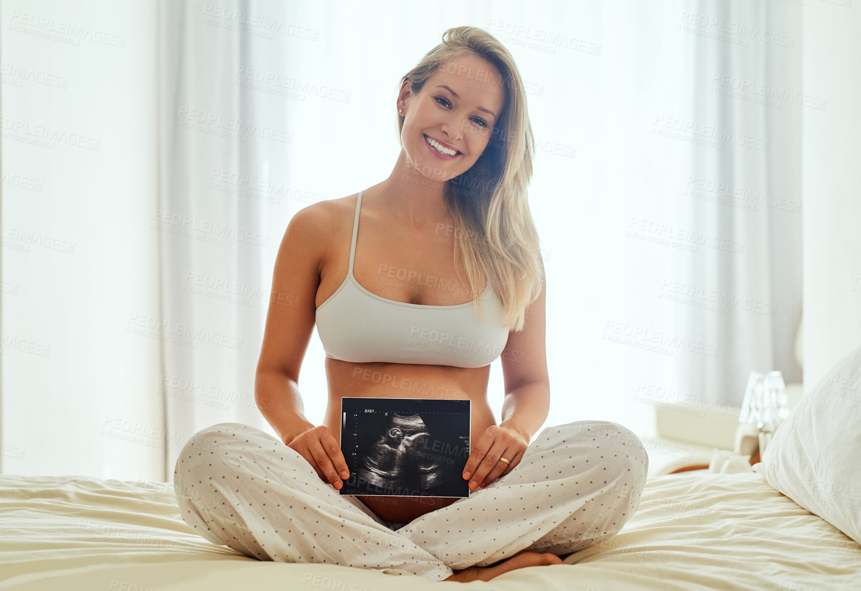 Buy stock photo Portrait, pregnant and woman with ultrasound on bed for love, prenatal care or relax in bedroom. Growth, pregnancy and future mom with sonogram for maternal health, happiness or gender reveal in home