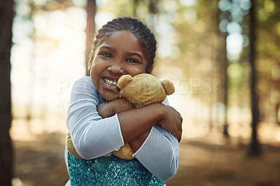 Buy stock photo Portrait of a little girl playing in the woods with her teddybear