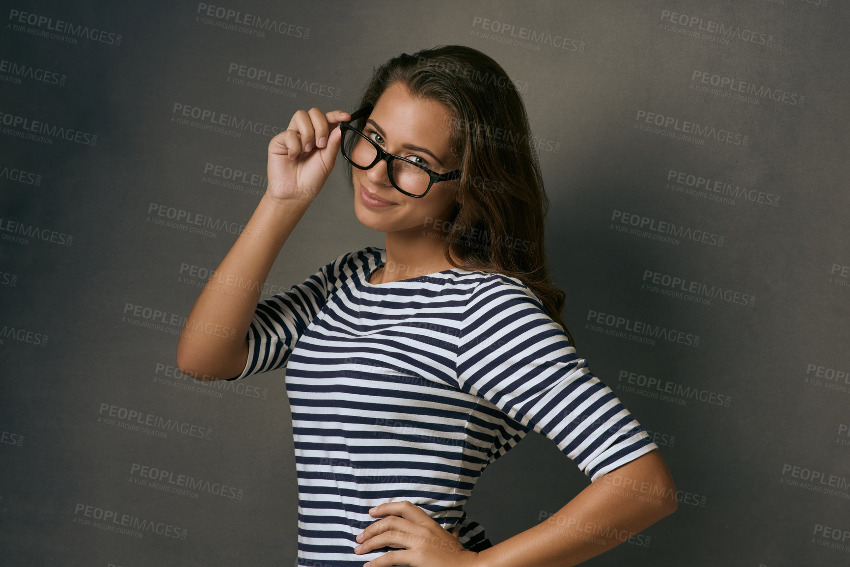 Buy stock photo Woman, portrait and confident with glasses in studio with prescription lens for eye care, optometry and healthcare. IT professional, happy and gray background with spectacles for vision and eyesight.