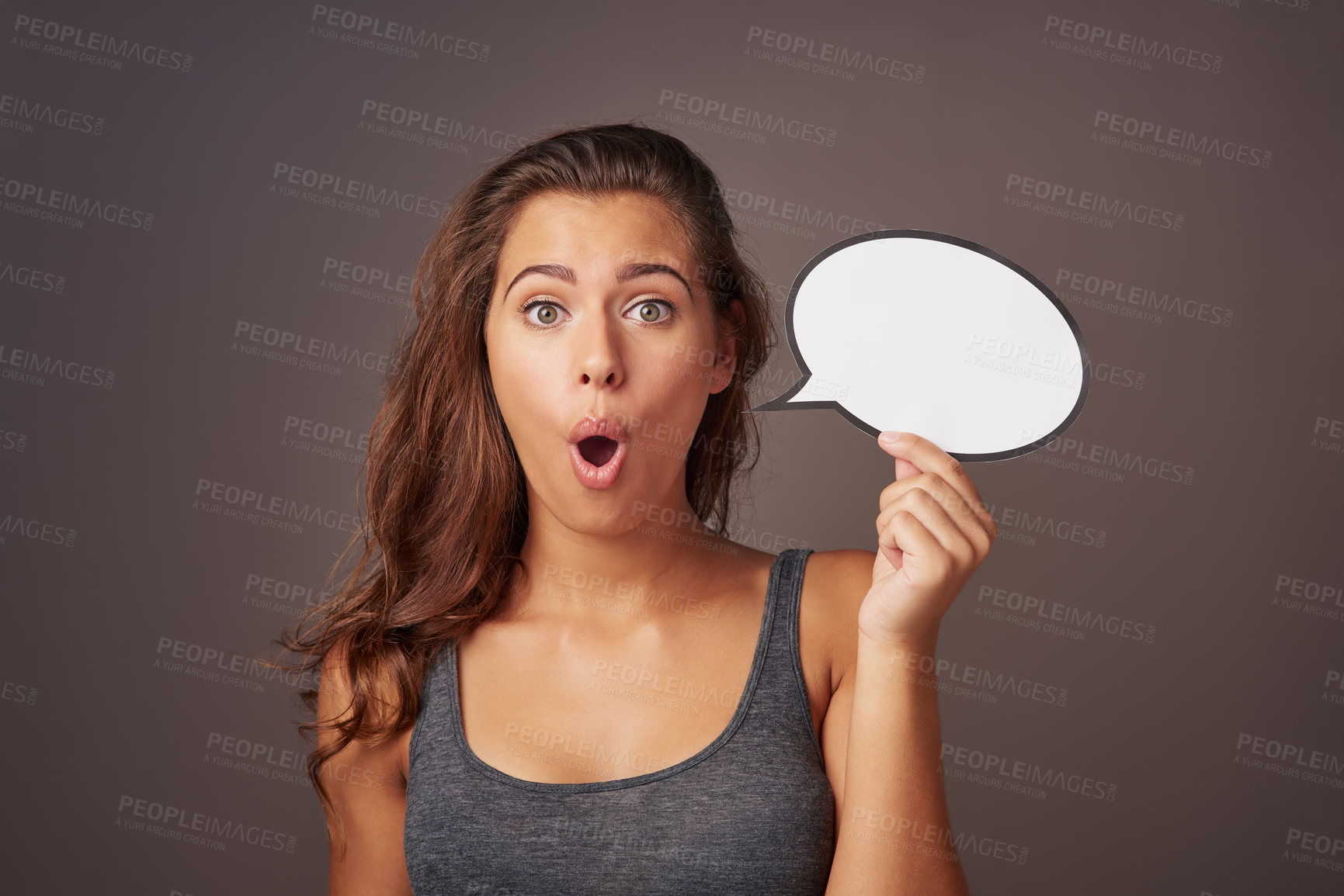 Buy stock photo Speech bubble, surprise and portrait of woman in studio for omg news, opinion and feedback. Mockup space, social media and person with sign for information, announcement and emoji on dark background