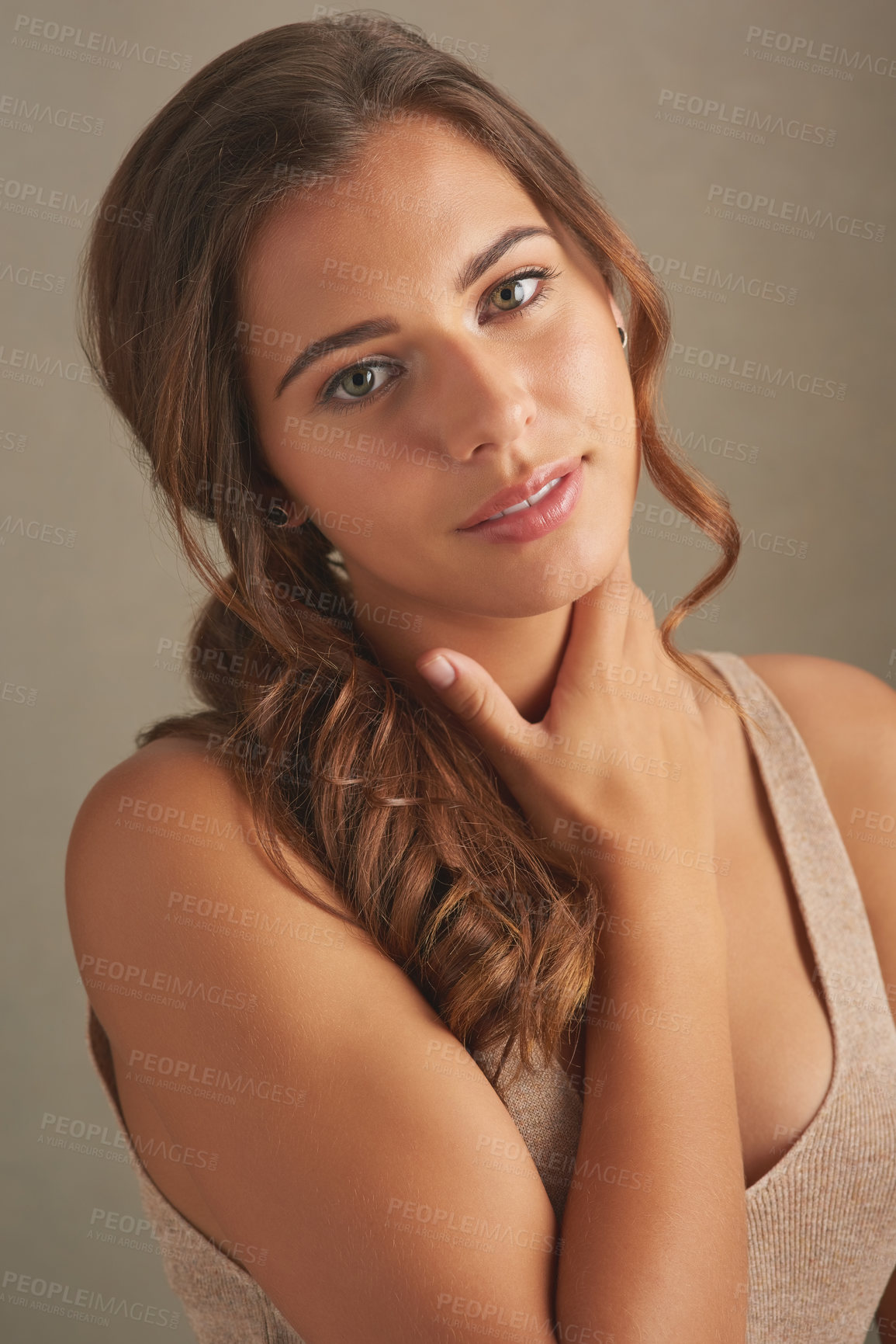 Buy stock photo Woman, beauty and portrait on studio background for skincare, dermatology and healthy skin with touch. Female person, smile and face as model for confident, aesthetic or routine with facial treatment