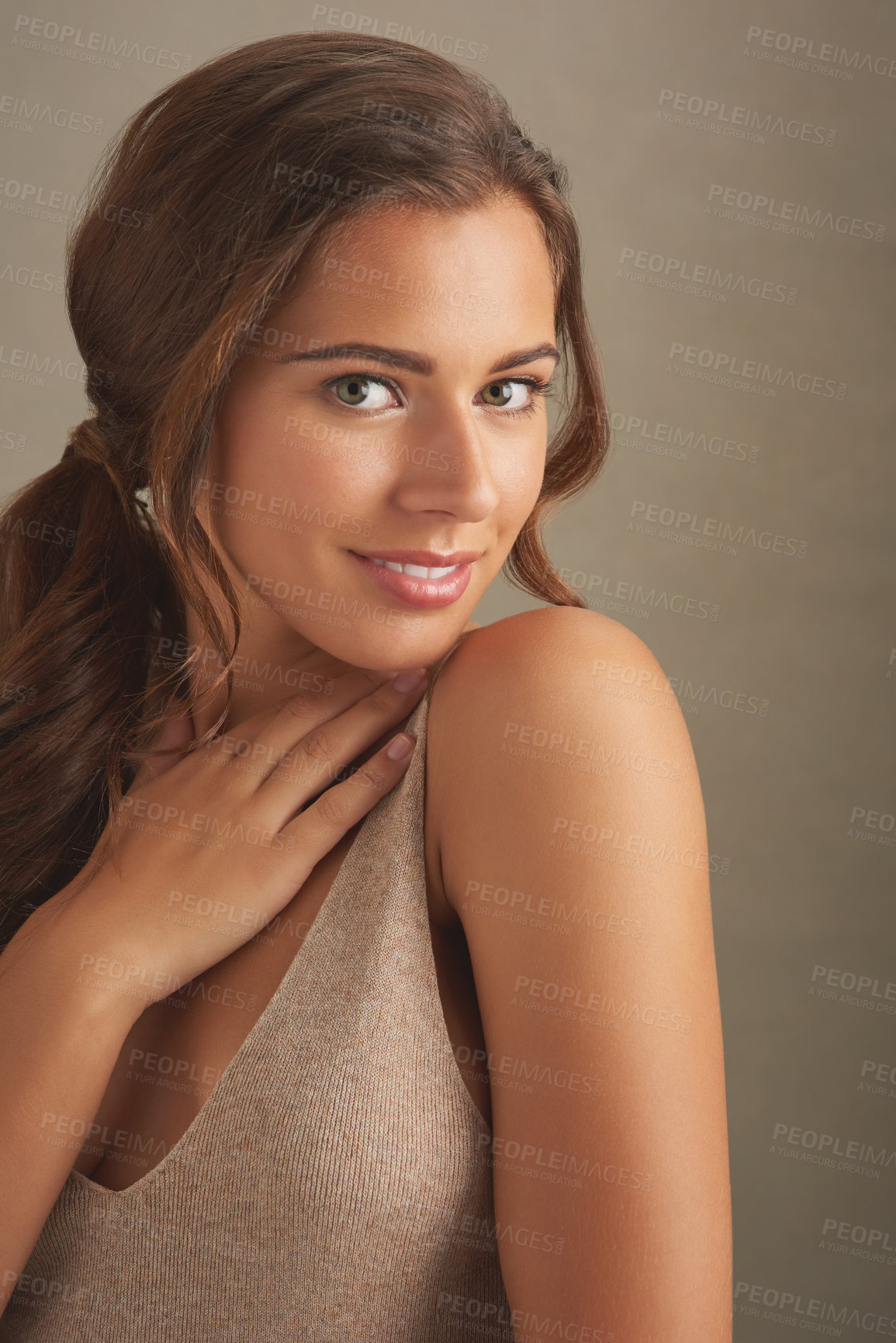 Buy stock photo Model, happy and portrait on studio background for skincare, dermatology or healthy skin with touch. Female person, smile and confident as woman for beauty, aesthetic or routine with facial treatment