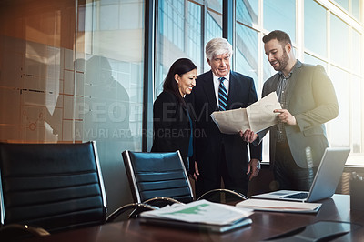 Buy stock photo Business man, woman and documents in boardroom with discussion, computer and reading at financial agency. People, team and group with paperwork for stats, feedback and collaboration in modern office