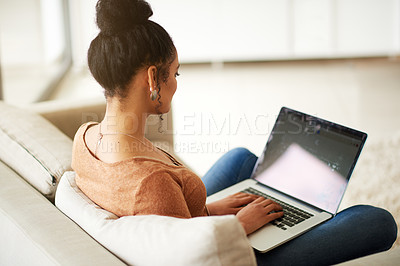 Buy stock photo Woman on couch with laptop, typing for blog and freelance copywriter working from home. Female freelancer in living room, copywriting and writing on pc, technology and remote work with connectivity