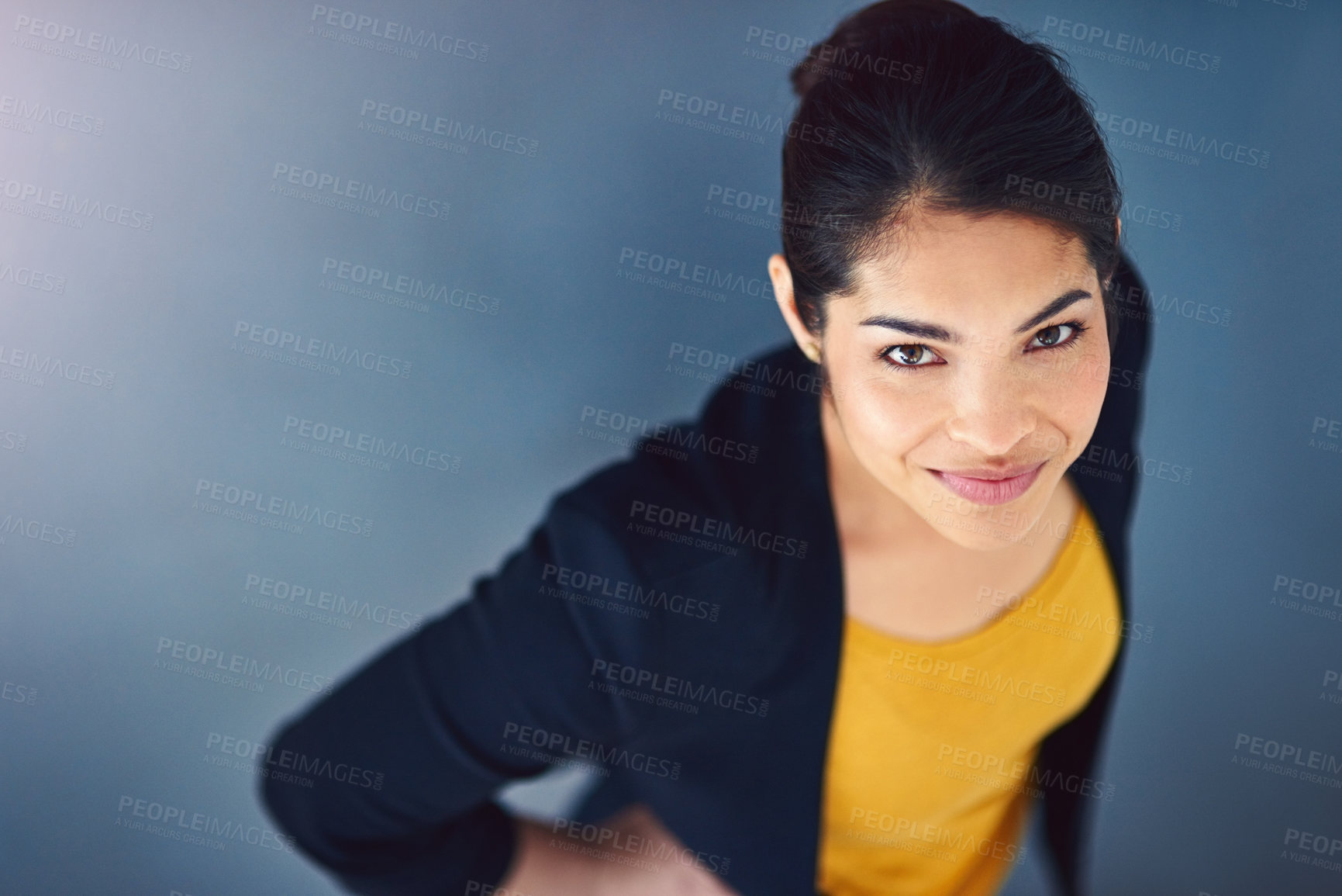 Buy stock photo Portrait, professional and woman in above studio with pride of career, lawyer services or ambition of opportunity. Confident, female person and smile, legal consultant or law firm on blue background