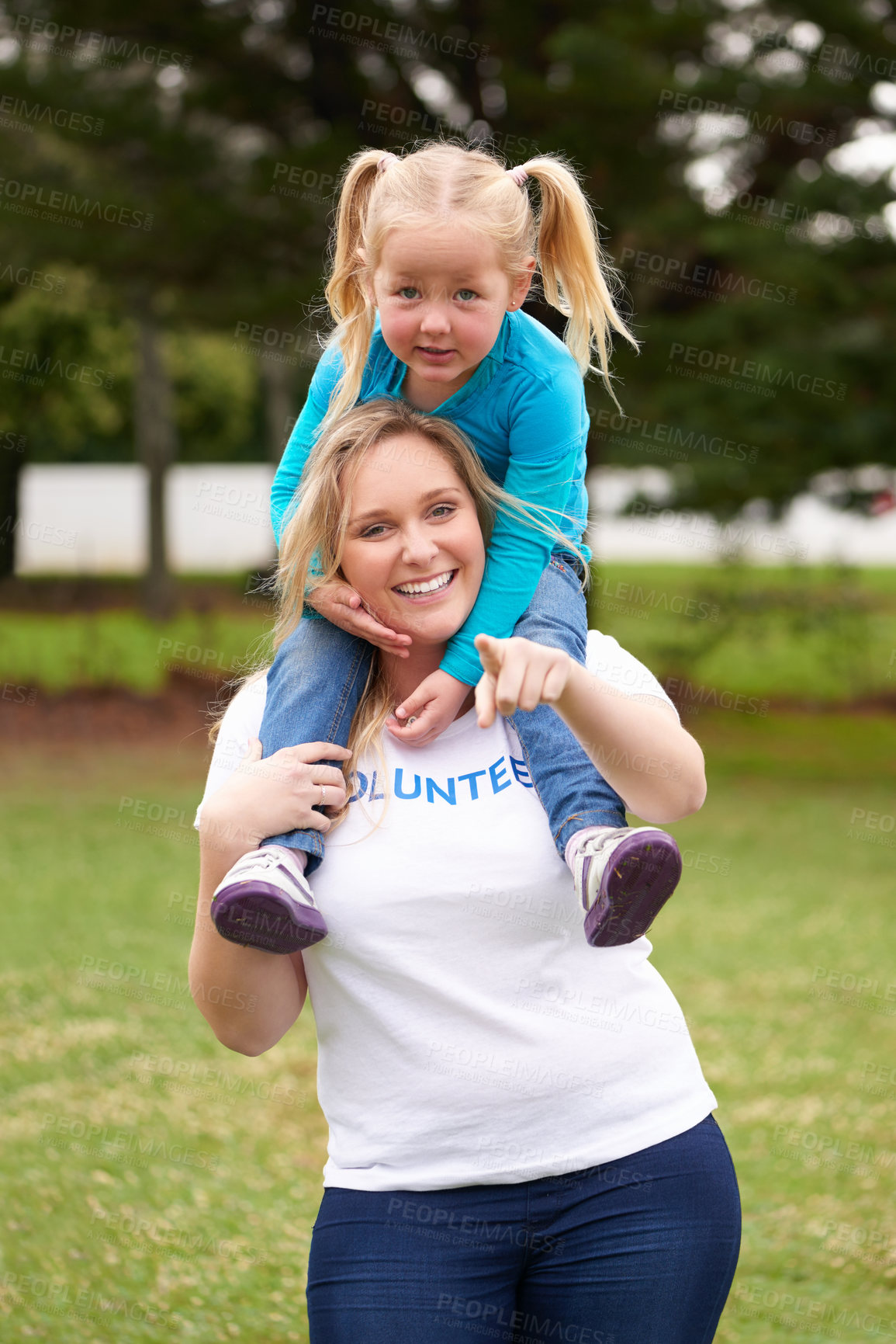 Buy stock photo Portrait, woman pointing and girl with piggyback in outdoor park for playing, fun or support. Charity, volunteering and female person with orphan kid for NGO outreach, child care or community service