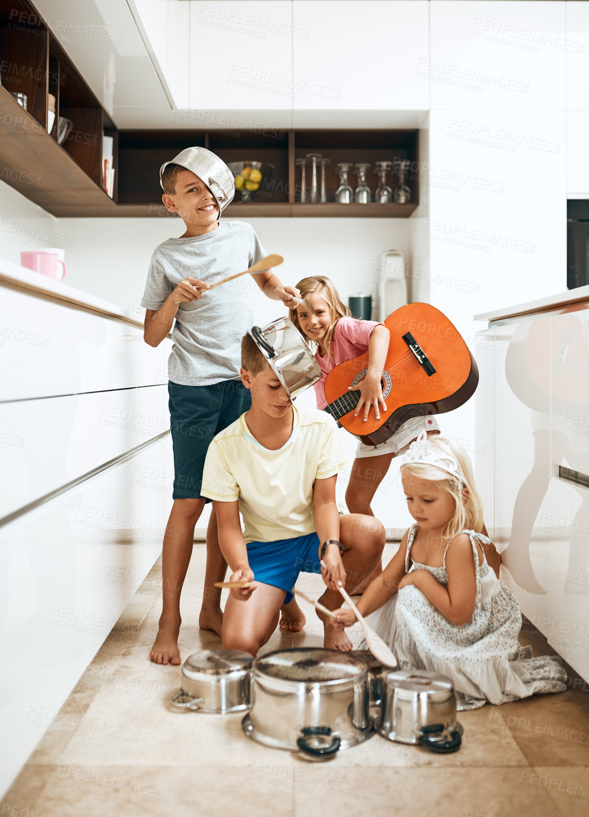 Buy stock photo Kids, pots and fun with band, home and happiness with noise, sound and bonding together. Group, girls and boys in kitchen, guitar and string instruments for friends, cheerful and playful with music