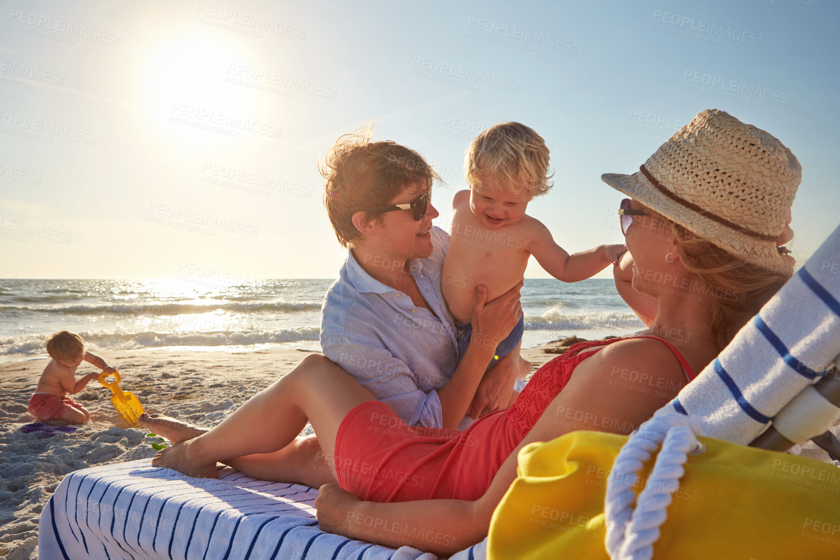 Buy stock photo Woman, man and kids by beach as family on travel, vacation in Istanbul for happiness or memory. Excited, parents and ocean for relax, together or bonding in child care for growth, development or love