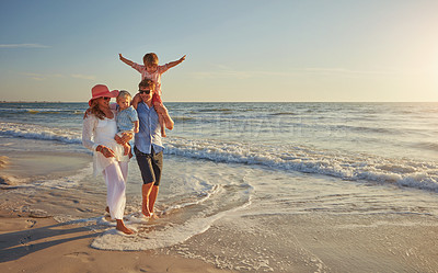 Buy stock photo Happy family, ocean holiday and walking, smile for vacation on tropical island. Man, woman and children together with freedom on beach for travel with wellness, mockup space at sunset in Mauritius