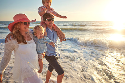 Buy stock photo Sunrise, holiday and walking with family, beach and bonding in trip, fun and outdoor in California. Sea, peace and children with parents, waves and water of ocean, relax and man with woman together