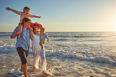 Buy stock photo Outdoor, holiday and fun for family, water and bonding in trip, walking and beach in California. Sea, peace and children with parents, waves and vacation of ocean, couple and man with woman together