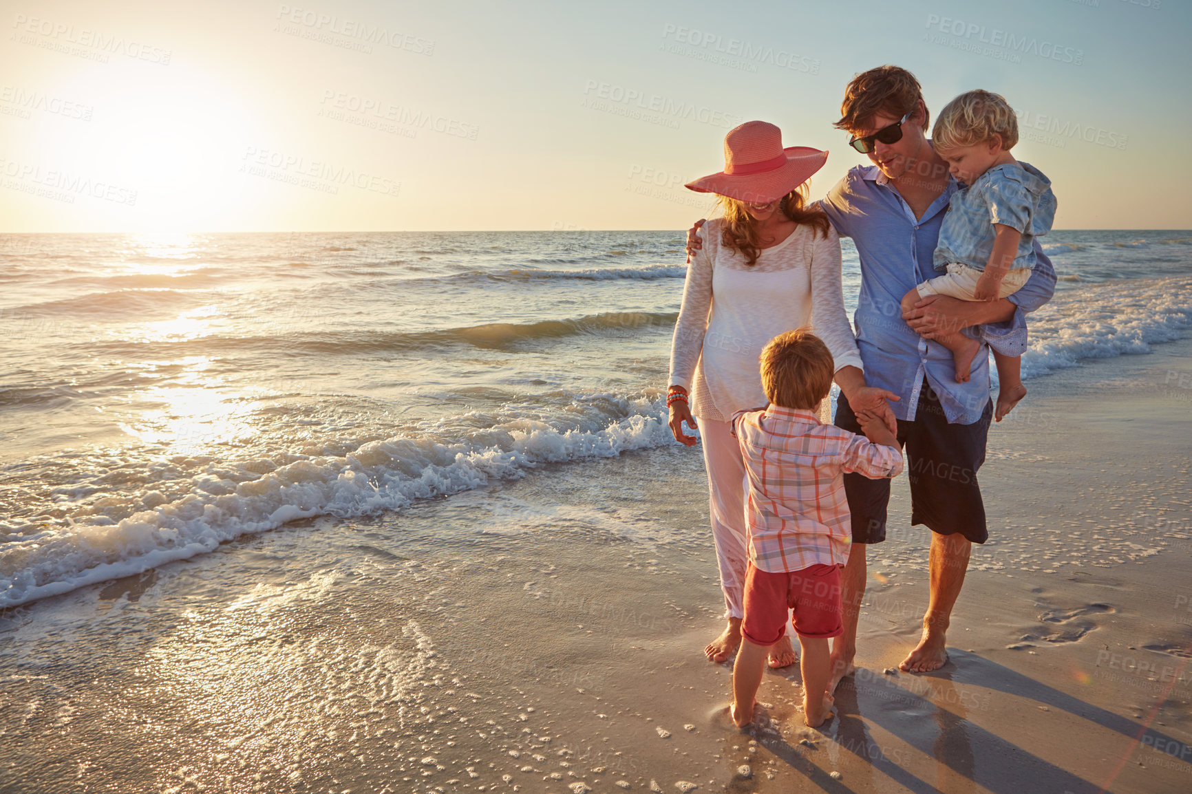 Buy stock photo Love, holiday and walking for family, beach and bonding in trip, fun and outdoor in California. Sea, peace and children with parents, waves and water of ocean, relax and man with woman together