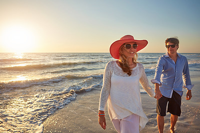 Buy stock photo Couple, man and woman holding hands beach trip for holiday fun, vacation and adventure with love. Relationship, male person and partner on seashore walking for summer travel, support and wellness