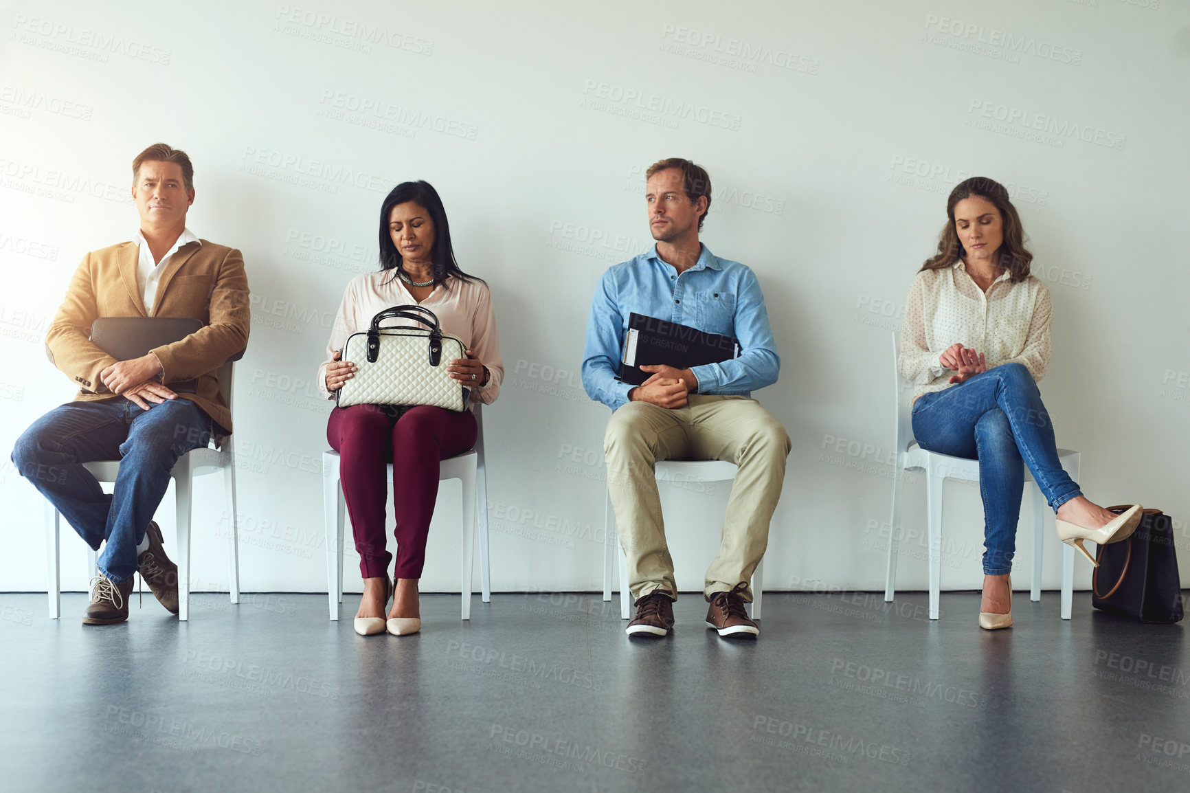 Buy stock photo Interview, people and thinking in waiting room for business, job opportunity and anxiety in office. Recruitment, candidates and inclusion in onboarding for diversity, hiring and application at agency