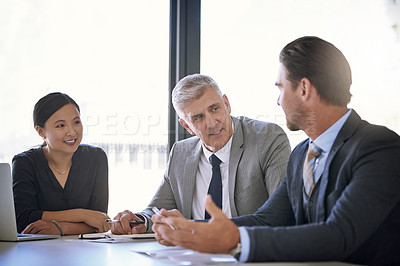 Buy stock photo Meeting, collaboration and strategy with a manager and team in the boardroom for a coaching seminar. Teamwork, planning and workshop with a mature CEO business man talking to his staff in the office