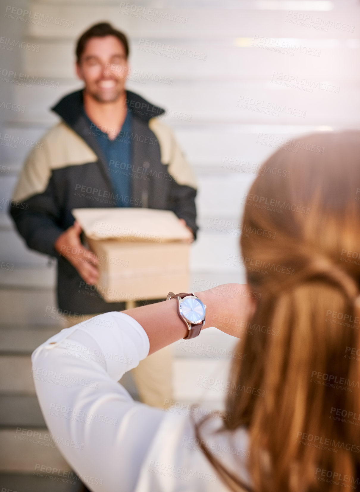 Buy stock photo Delivery man, late and customer with time check for box of groceries at front door as courier service. Carrier, delayed and behind schedule with package from logistics company for frustrated woman