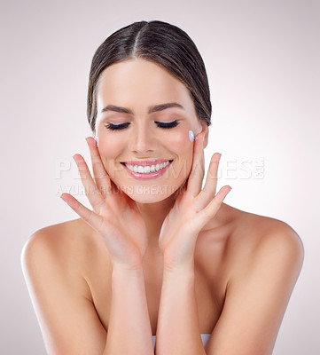 Buy stock photo Woman, cream and studio for moisturizing skin, beauty and cosmetics lotion for even skintone. Female person, dermatology facial and hydration glow on white background, sunscreen and apply ointment