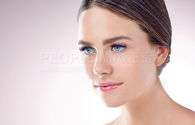 Buy stock photo Beauty, skincare and woman in studio for glow, makeup or thinking of wellness isolated on background mockup space. Cosmetics, face and model in spa for dermatology, health and shine for aesthetic