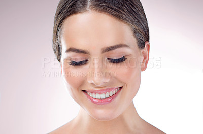 Buy stock photo Happy, lip gloss and face of woman with makeup, eyeshadow or wellness in white background in studio. Shine, smooth texture or proud model with glow, skincare cosmetics or beauty treatment results