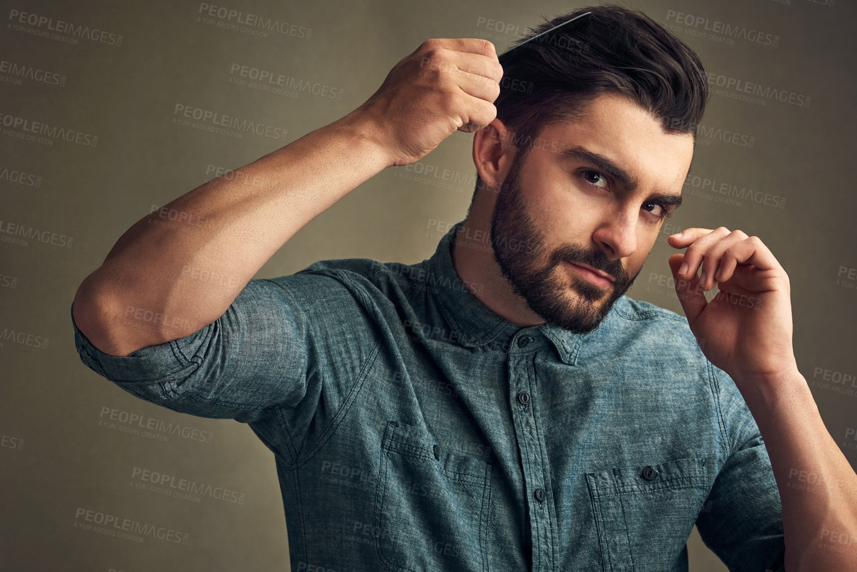 Buy stock photo Man, portrait and comb on studio background for grooming, confident haircare and maintenance. Male person, cosmetic tool and brushing for getting ready, treatment and preparation by beauty product