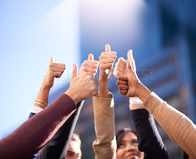 Buy stock photo Thumbs up, group or people in agreement with hands on blue sky outdoors. Teamwork, collaboration or community diversity and colleagues in support gesture outside in city background with flare mockup