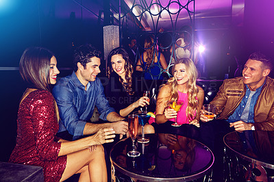 Buy stock photo People, laughing or friends in nightclub with drinks, glass or cocktails for vip event, funny joke or group reunion. Happy, relax or dark disco party couch with alcohol, smile or social celebration