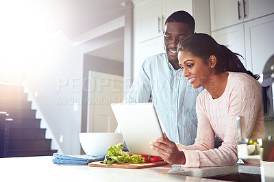 Buy stock photo Couple, tablet and cooking in kitchen for health, online recipe and vegetables for nutrition dinner. People, marriage and ingredients for food in home, bonding and meal prep website for instructions