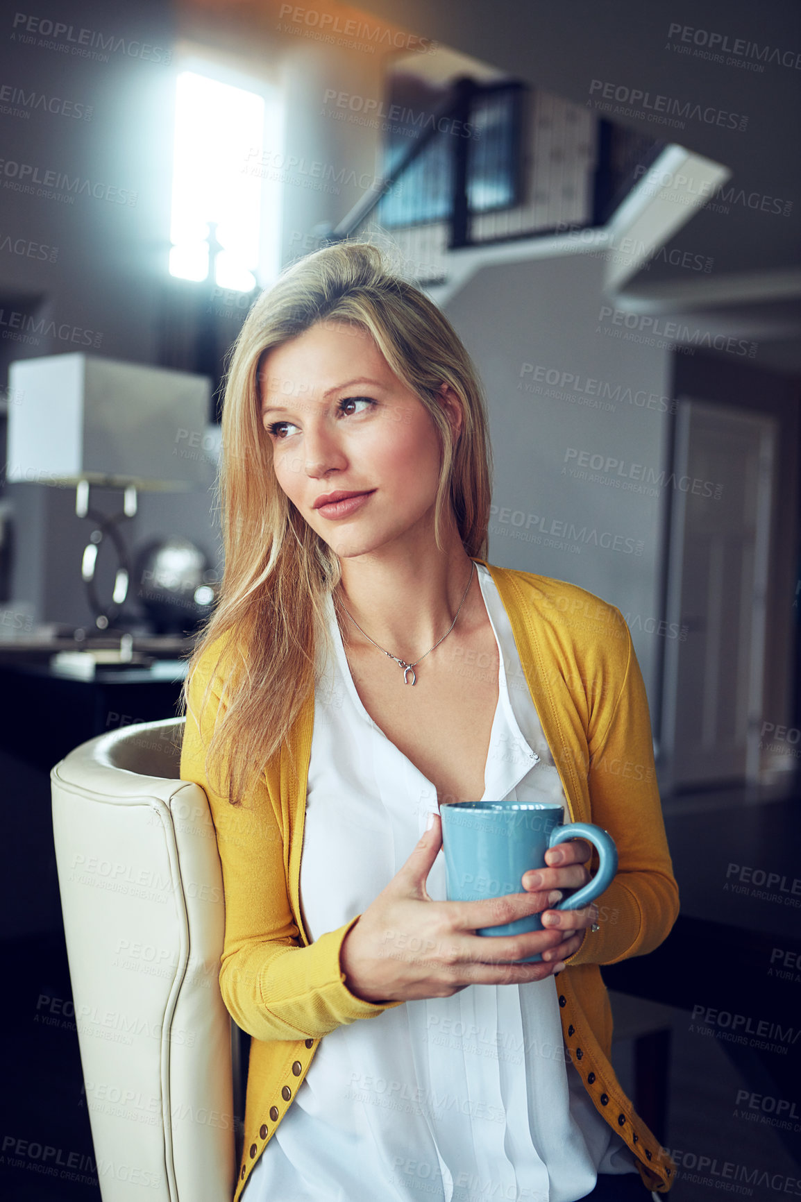 Buy stock photo Thinking, coffee and woman on sofa in home for relaxing, chill and calm with drink, beverage and tea. Apartment, morning and person wonder in living room for wellness, rest and break for remote work