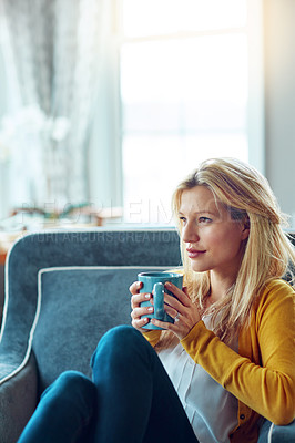 Buy stock photo Home, thinking and woman with coffee, rest and remember on weekend, peace and sofa in living room. House, couch and person with tea, daydreaming and smile for drink in lounge, relax and morning