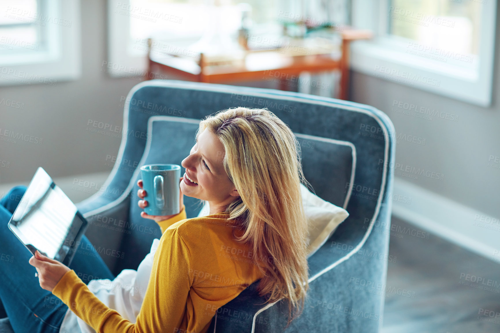 Buy stock photo Break, tablet and woman on couch, coffee and rest in living room, morning and happy with social media. Relax, calm and girl with cup, smile or peace in lounge, cozy and person with tea in apartment