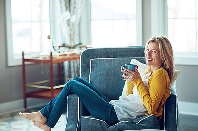 Buy stock photo Woman, lounge and drinking coffee in comfort, relax or break at home with hot beverage. Female person, happy and rest in armchair for calm, apartment or peace with happiness in modern house or couch