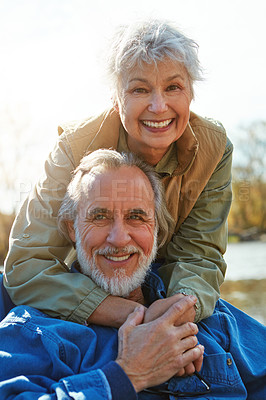 Buy stock photo Happy, nature and portrait of senior couple in forest hugging for love, care and marriage together. Smile, travel and elderly man and woman in retirement embracing by woods in Autumn in England.