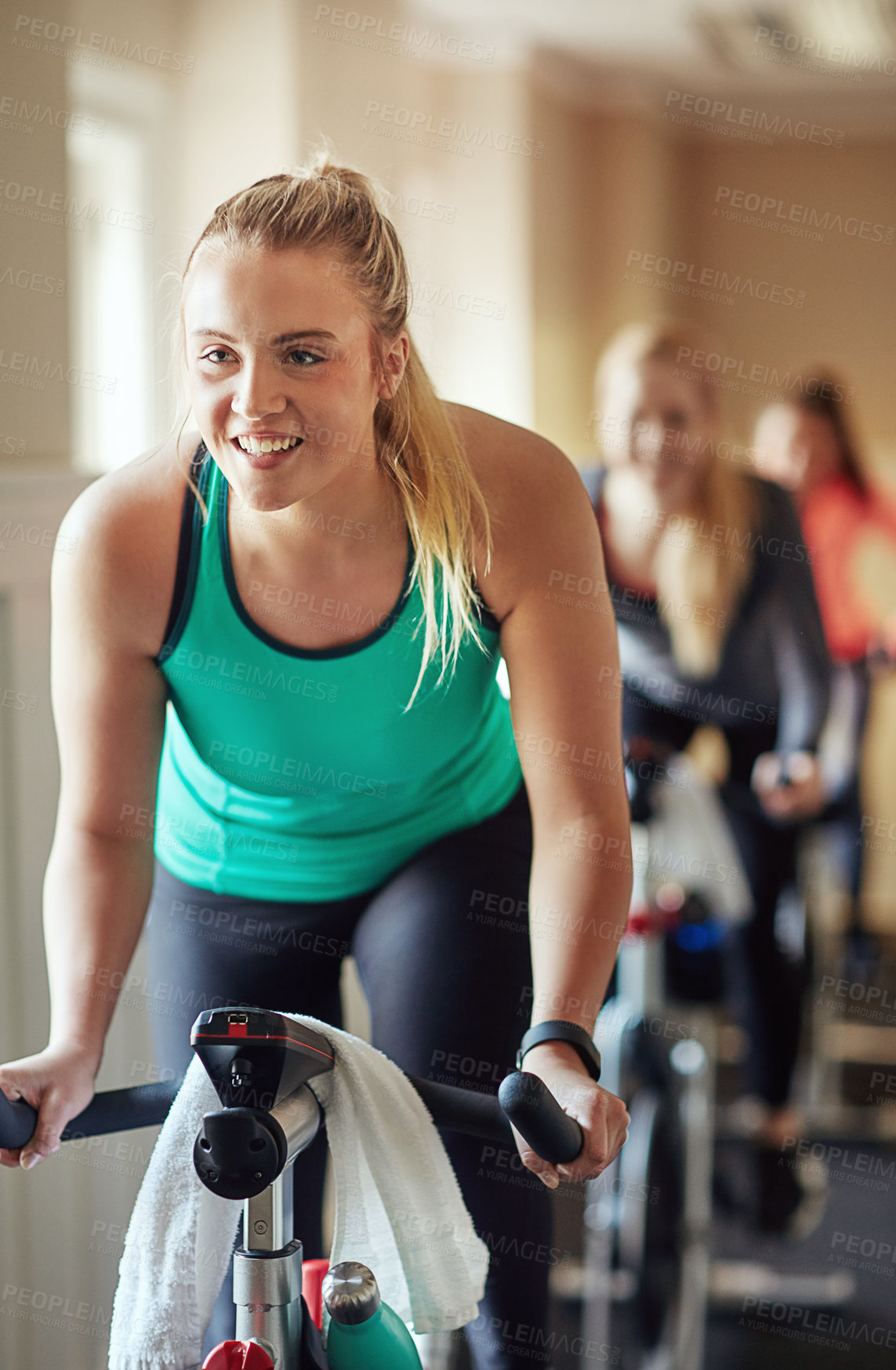 Buy stock photo Fitness, exercise bike and girl at a gym for cycling training, wellness and morning cardio routine. Spinning class, machine or women at sports studio for resilience workout, challenge or performance