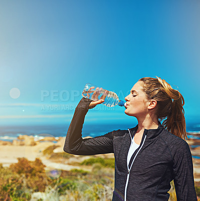 Buy stock photo Woman drink water, health and fitness with blue sky, athlete outdoor with hydration and mockup space. Exercise at beach, female person drinking h2o from bottle with workout and break from training