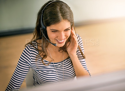 Buy stock photo High angle shot of an attractive young woman working in a call center