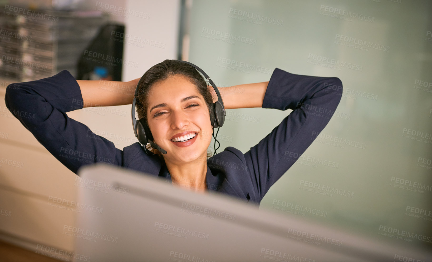 Buy stock photo Call center, computer and relax with portrait of woman in office for advice, help or lead generation. Break, headset and smile of happy employee in customer support workplace with hands behind head