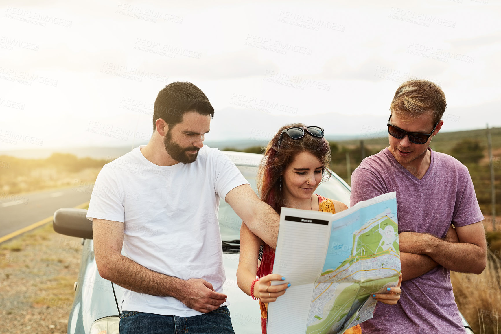 Buy stock photo Friends, reading map and travel on road trip, vacation and planning holiday for navigation by car transport. Group, people and direction guide for journey, adventure and location destination outdoor