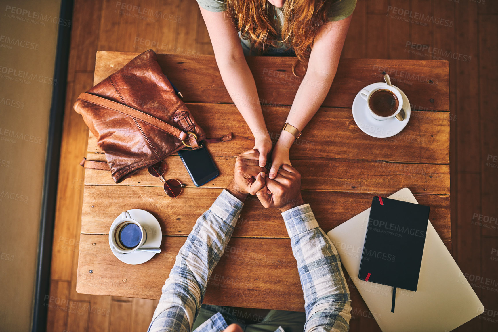 Buy stock photo Above, couple and cafe at table with holding hands, love or conversation for romance together. Man, woman and valentines date in coffee shop for support, bonding or talk for happiness, care and trust